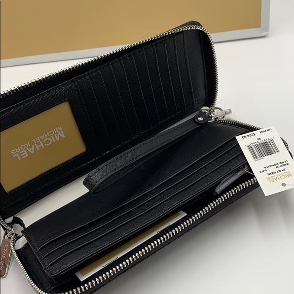 MK Jet Set Travel Continental PVC Signature Zip - Picture 5 of 16